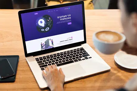 macbook-pro-mockup-featuring-a-person-drinking-coffee-2326-el1